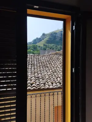 a view of a tile roof from a window at Corleone bed and breakfast in Corleone