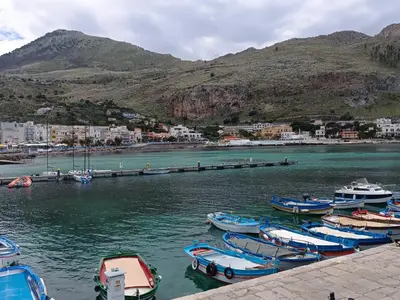 a group of boats are docked in a harbor at La casetta di Cecilia in Palermo