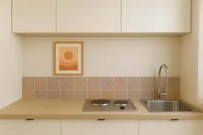 a kitchen with a sink and a counter top at Casetta di Giulio in Palermo