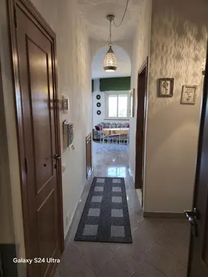 a hallway with a door leading to a dining room at GiRosa House in Bagheria