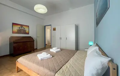a bedroom with a bed with two towels on it at Stunning Apartment In Balestrate in Balestrate