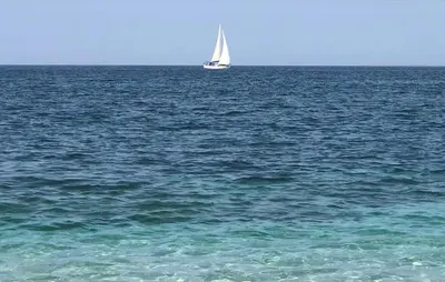 a sail boat in the middle of the ocean at 5 Bedroom Stunning Apartment In Trappeto in Trappeto