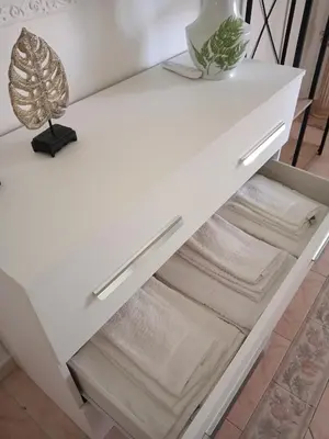 a white console table with towels on it at Casa Vacanza Marion in Palermo