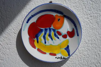 a plate with a picture of a fish on it at Orizzonte d'acqua Palermo in Palermo