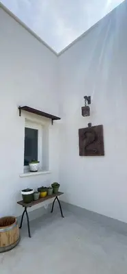 a room with a table with bowls on it at Rui2 Exclusive Accomodation in Terrasini