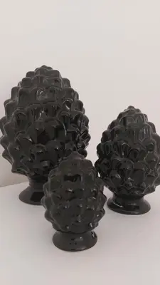 two black vases sitting next to each other at L'ulivo-casa tua a Palermo, a due passi dal centro in Palermo