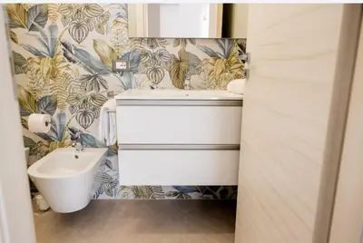 a bathroom with a sink and a toilet at B&B Terre del cretto in Nuova Gibellina