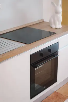a kitchen counter with a stove top oven at Encanto Apartment in Palermo