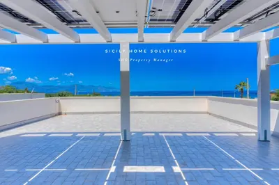 a view from the roof of a building with a view of the ocean at Villa Stella con piscina privata 500 mt dal mare By Sicily Home Solutions in Trappeto