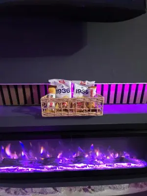 a basket of food sitting on top of a fireplace at Thaleia Suite & Spa in Palermo