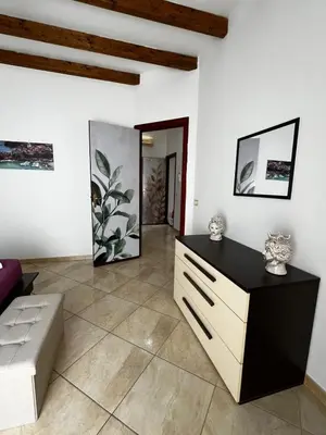 a living room with a couch and a table at Dimora del Moro in Castellammare del Golfo