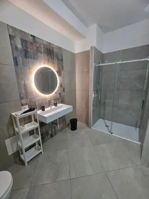 a bathroom with a sink and a shower at Alle Porte di San Vito in San Vito lo Capo
