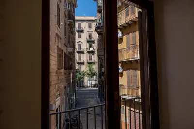 a view of a street from a window at Casa Donna Ina in Palermo