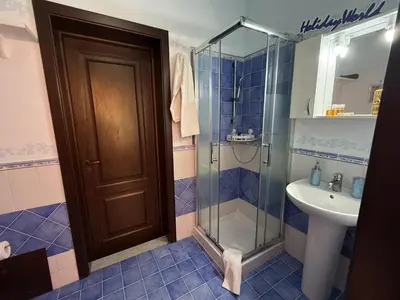 a bathroom with a shower and a sink at Nuovo Basile by Holiday World in Palermo