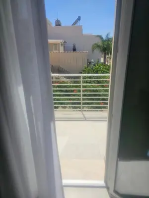 an open door with a view of a balcony at Alle Porte di San Vito 2 in San Vito lo Capo