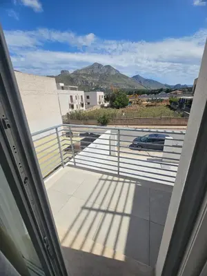 a balcony with a view of a mountain at Alle Porte di San Vito 2 in San Vito lo Capo