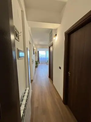 a hallway with a hallway leading to a room at La Casetta Panoramica in Palermo