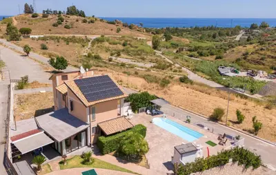 an aerial view of a house with solar panels on the roof at Gorgeous Home In Trabia in Trabia