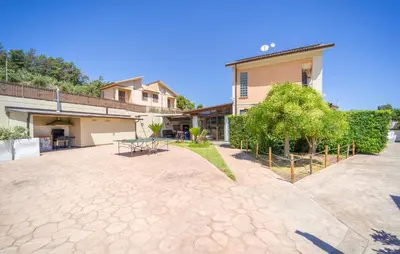 a patio in front of a house at Gorgeous Home In Trabia in Trabia