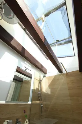 a room with a glass door and a window at Centro storico apartment & Loft - Amnesia Holiday Home in Palermo