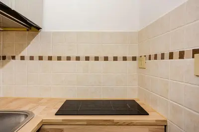 a kitchen with a sink and a counter at Casa Vacanza Dante 17 Carini in Carini