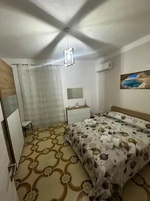 a bedroom with a bed with teddy bears on it at Casa vacanze I mori in Bagheria