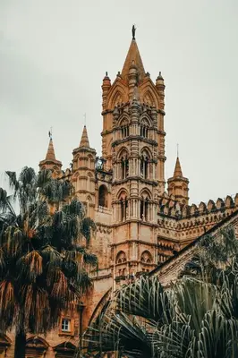a fountain in front of a building with a dome at Easydoro Apartment in Palermo