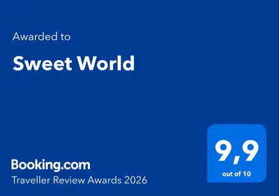 a blue square with the words upgraded to sweet world at Sweet World in Terrasini