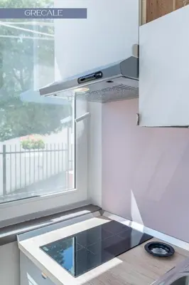 a small kitchen with a sink and a window at Baida Apartments in Palermo