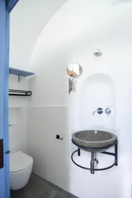 a bathroom with a sink and a toilet at Re mare exclusive home in Terrasini