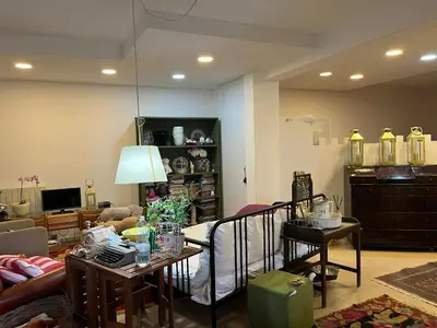 a living room with a couch and a table at Villa Giulia Maria in Alcamo