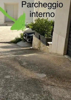 a car parked in front of a building at Villa Giulia Maria in Alcamo