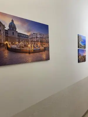 a painting of a building on a wall at Florio Rooms in Palermo