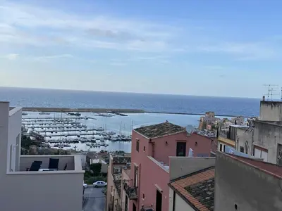 a view of a city with a harbor and the ocean at Fantastic sea & harbour view Nino Bixio in Castellammare del Golfo