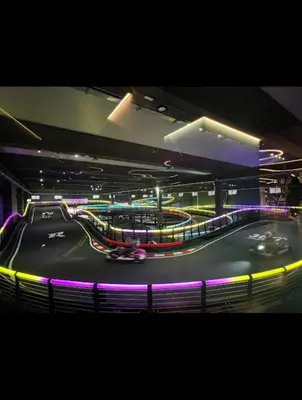 a race track at night with cars on a track at Fantastic sea view Via Duchessa in Castellammare del Golfo