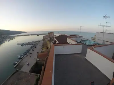 a view of a marina from the roof of a building at Angolo di CIELO in Castellammare del Golfo