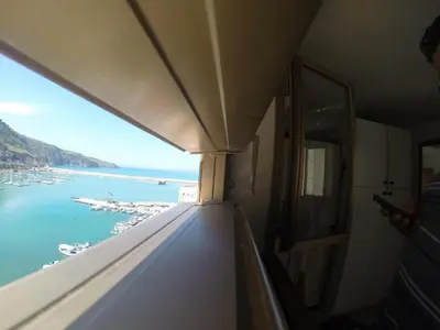 a view of the ocean from a train window at Angolo di CIELO in Castellammare del Golfo