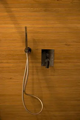 a hose hooked up to a electrical outlet on a wall at I Zingalini Affittacamere in Casteldaccia