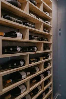a wine cellar filled with lots of wine bottles at Palmar Boutique Hotel in Campofelice di Roccella
