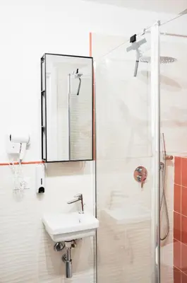 a bathroom with a sink and a shower at Foresteria del Genio - Luxury Suites & Urban Spa in Palermo