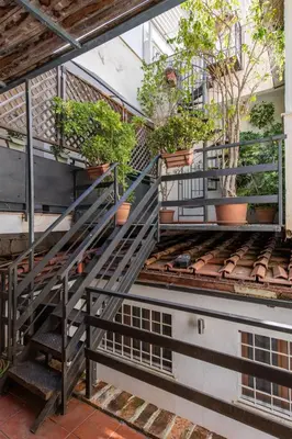 a set of stairs with potted plants on them at Casa Annibale con Vista Mare by Wonderful Italy in Palermo