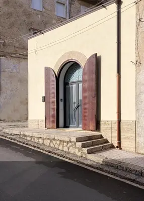an entrance to a building with a door and stairs at Casa Vacanza 