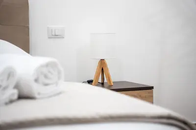 a close up of a bed in a room at Home1995 in Palermo