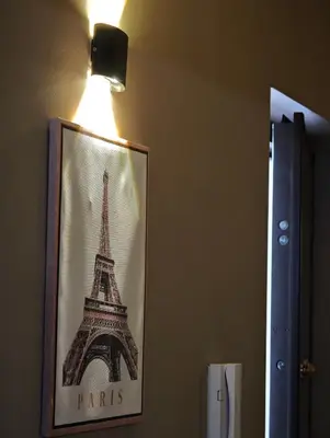 a picture of the eiffel tower on the wall at Casa Pitrè in Palermo