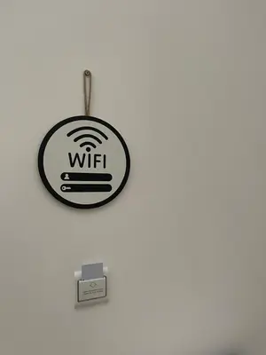 a wii sign hanging on a wall at Donna Franca in Cinisi