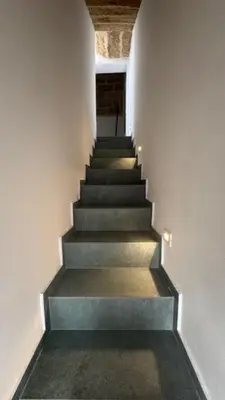 a stairway leading up to a building with a stair case at Casarkeb in Terrasini