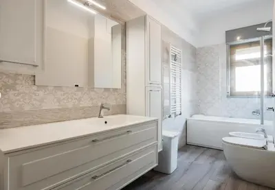 a bathroom with a sink and a tub and a toilet at Guest House Conca D'oro in Palermo