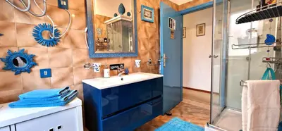 a bathroom with a sink and a shower at Villa Dream House Scopello in Scopello