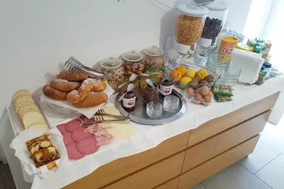 a buffet with many different types of food on it at B&B Cala Peppa in Palermo