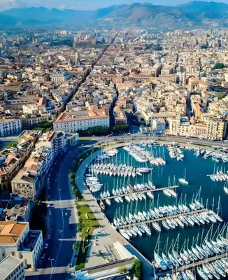 an aerial view of a harbor with boats at La Casetta di Lilla in Palermo